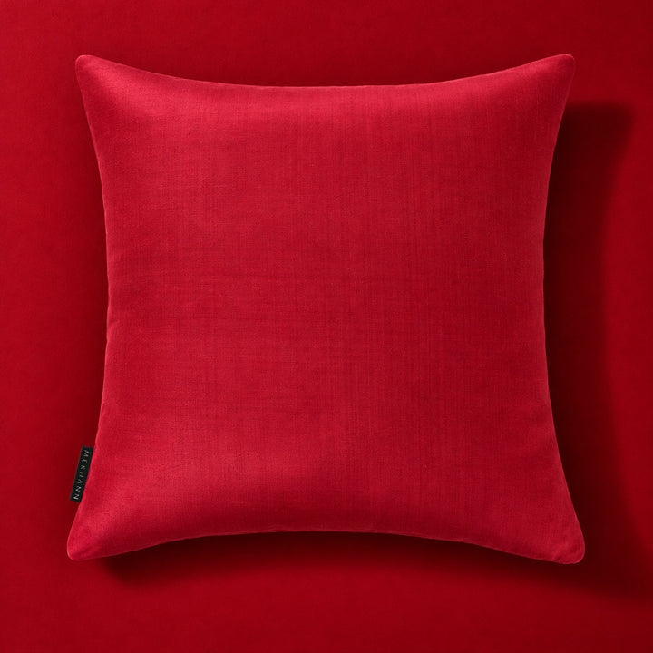 Maroon reverse of the Frond Cushion in Ivory. 
