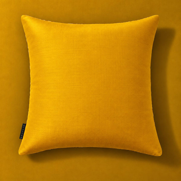 Saffron reverse of the Frond Cushion in Ivory. 