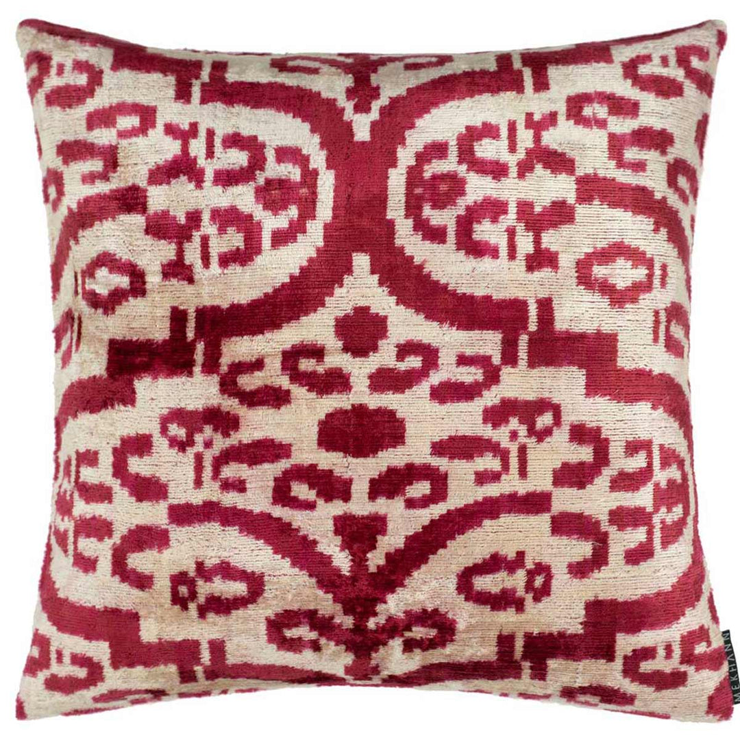 Front view of Mekhann's abstract maroon pattern velvet cushion, revealing a maroon and cream velvet pattern.