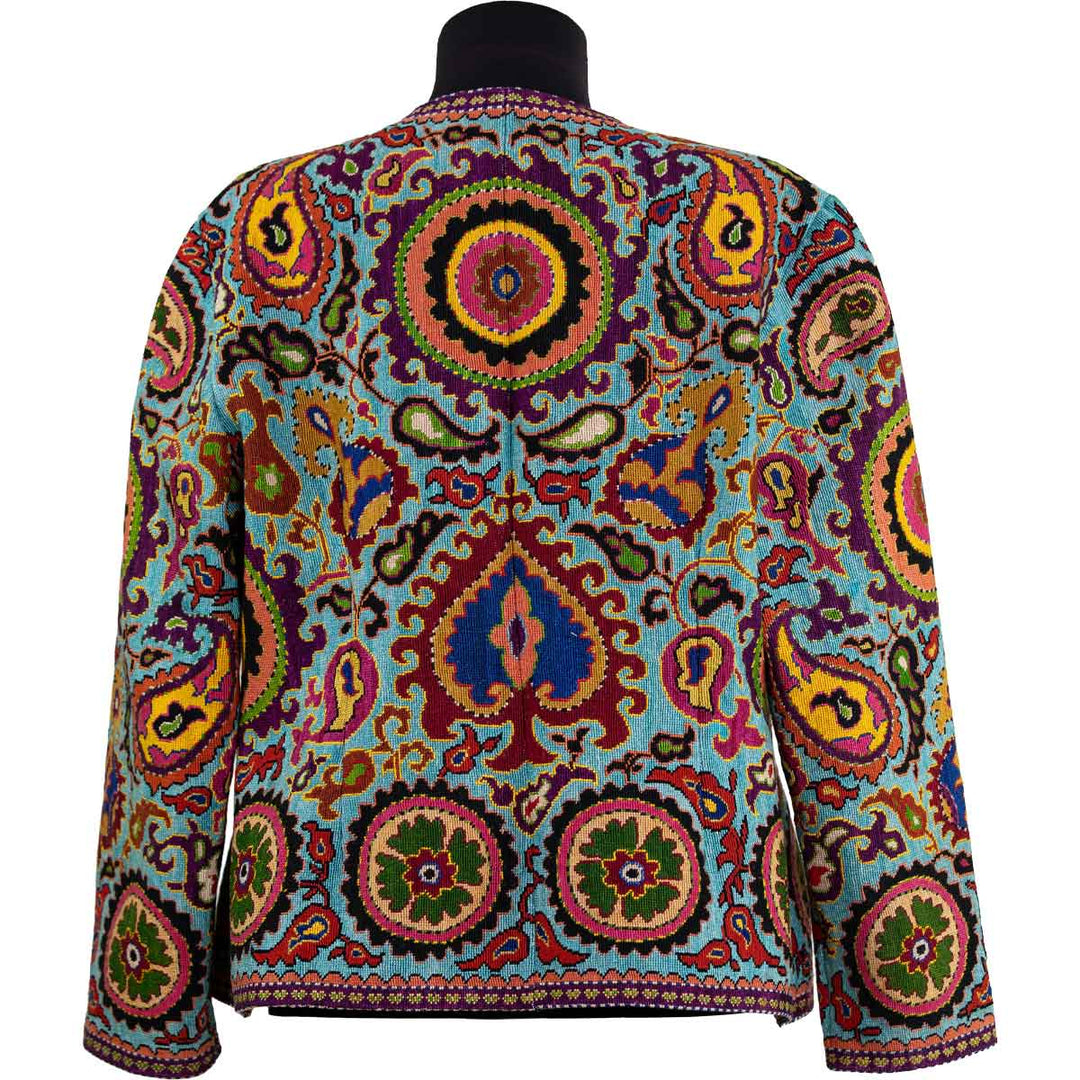 Backl view of Mekhann's fully embroidered plena consuta jacket, displaying one large central medallion with purple, orange and green silk threads.