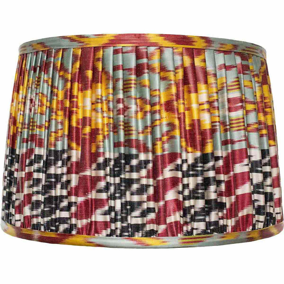 Front view of Mekhann's multicolour ikat silk lampshade, hand-pleated with an array of sustainable dyes for a dynamic look.
