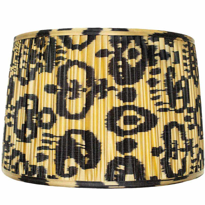 Mekhann's large black on cream ikat silk lampshade, an elegant home decor piece, coloured with eco-friendly dyes for a sophisticated look.