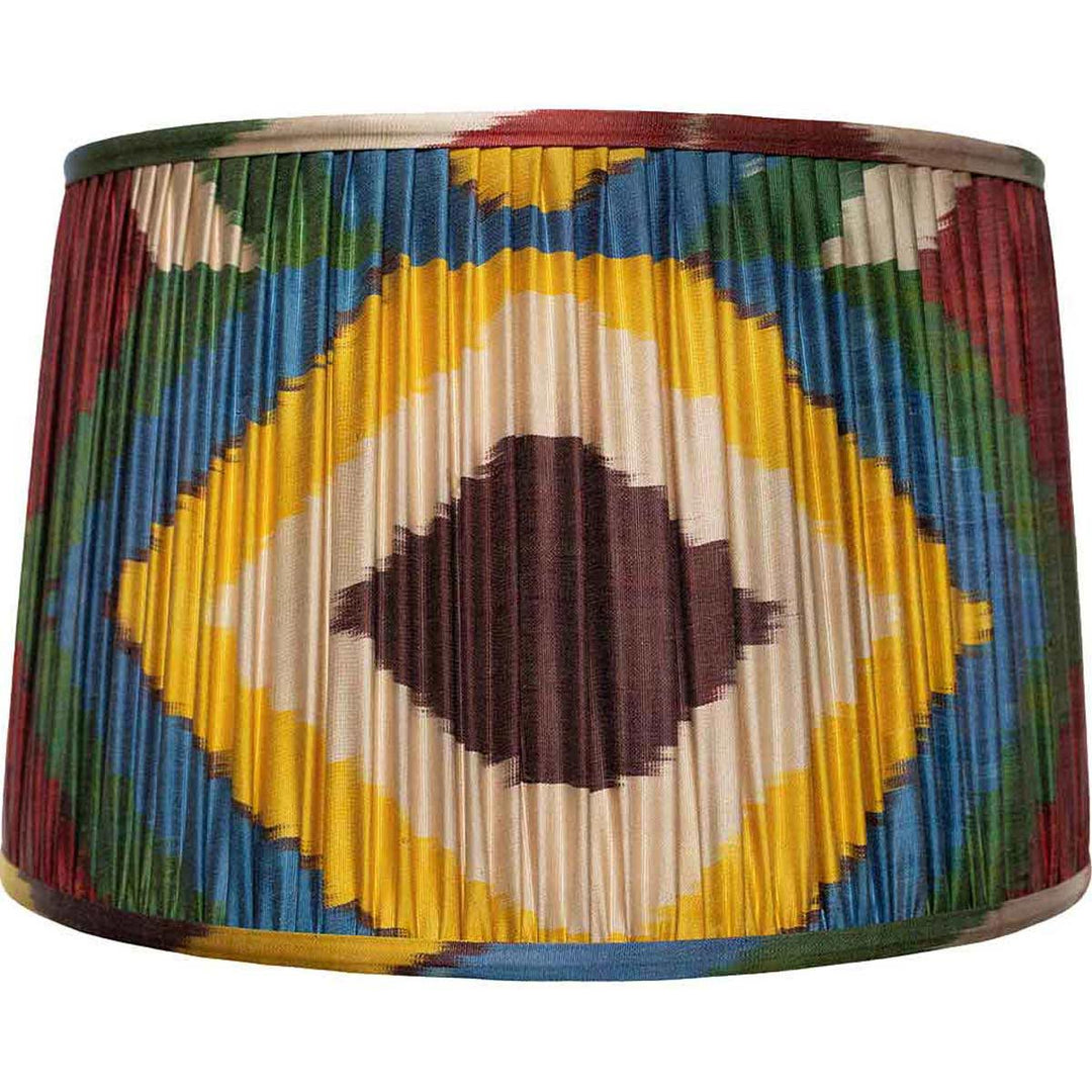 Mekhann's large hand-pleated silk ikat lampshade in a dazzling array of colours, featuring an eye-catching diamond motif.