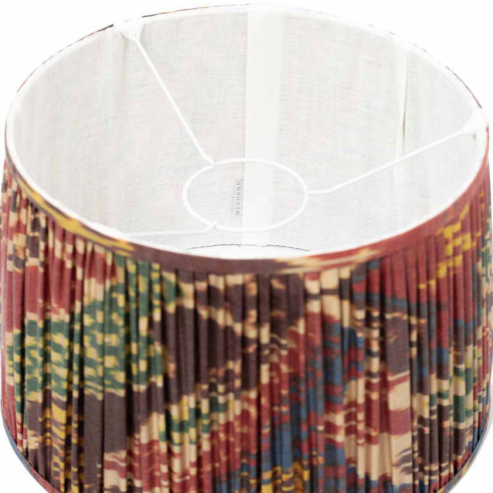 Interior perspective of Mekhann's silk lampshade, revealing the intricate ikat pattern in a symphony of natural colours