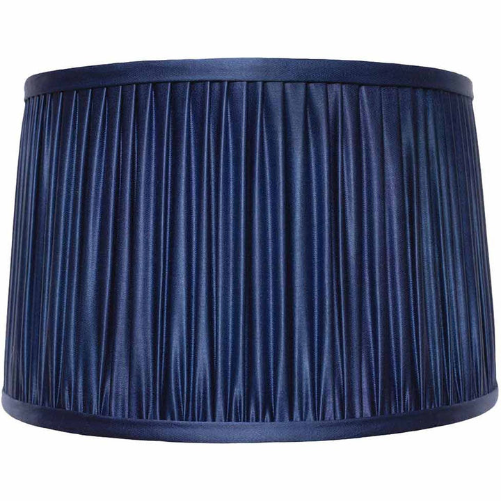 Front view of Mekhann's navy blue silk lampshade, highlighting the luxurious sheen and precise pleats.