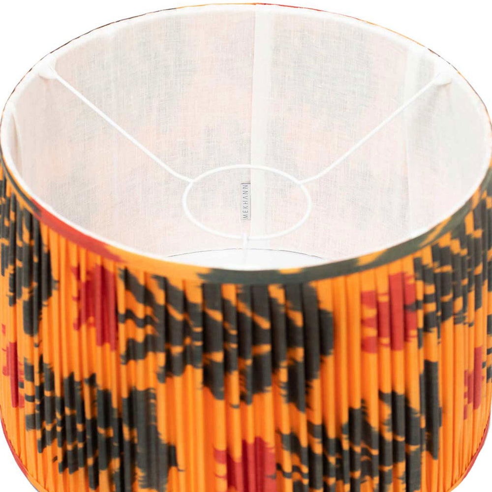 nside glimpse of Mekhann's orange and black floral silk lampshade, displaying the rich texture and quality craftsmanship.