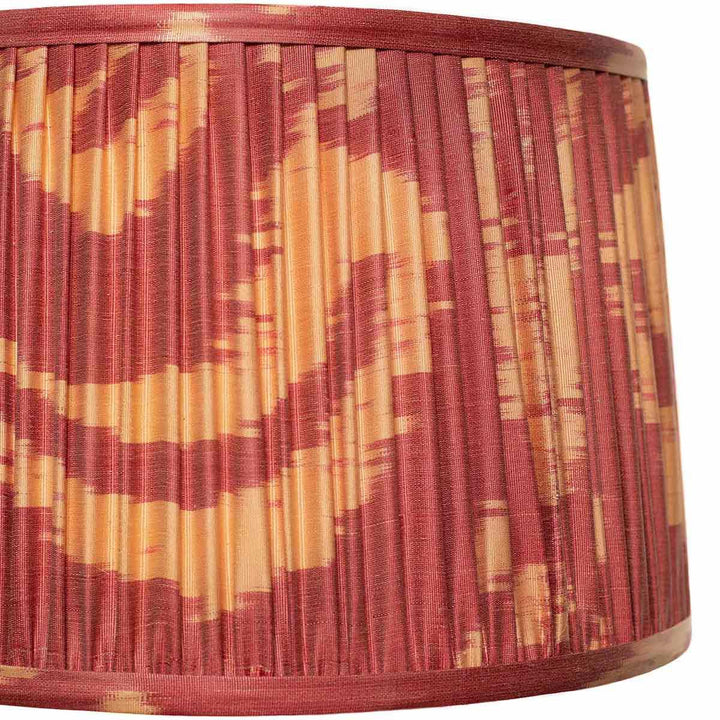 Close-up of the warm ikat patterns on Mekhann's silk lampshade, emphasizing the handcrafted quality and colour harmony.