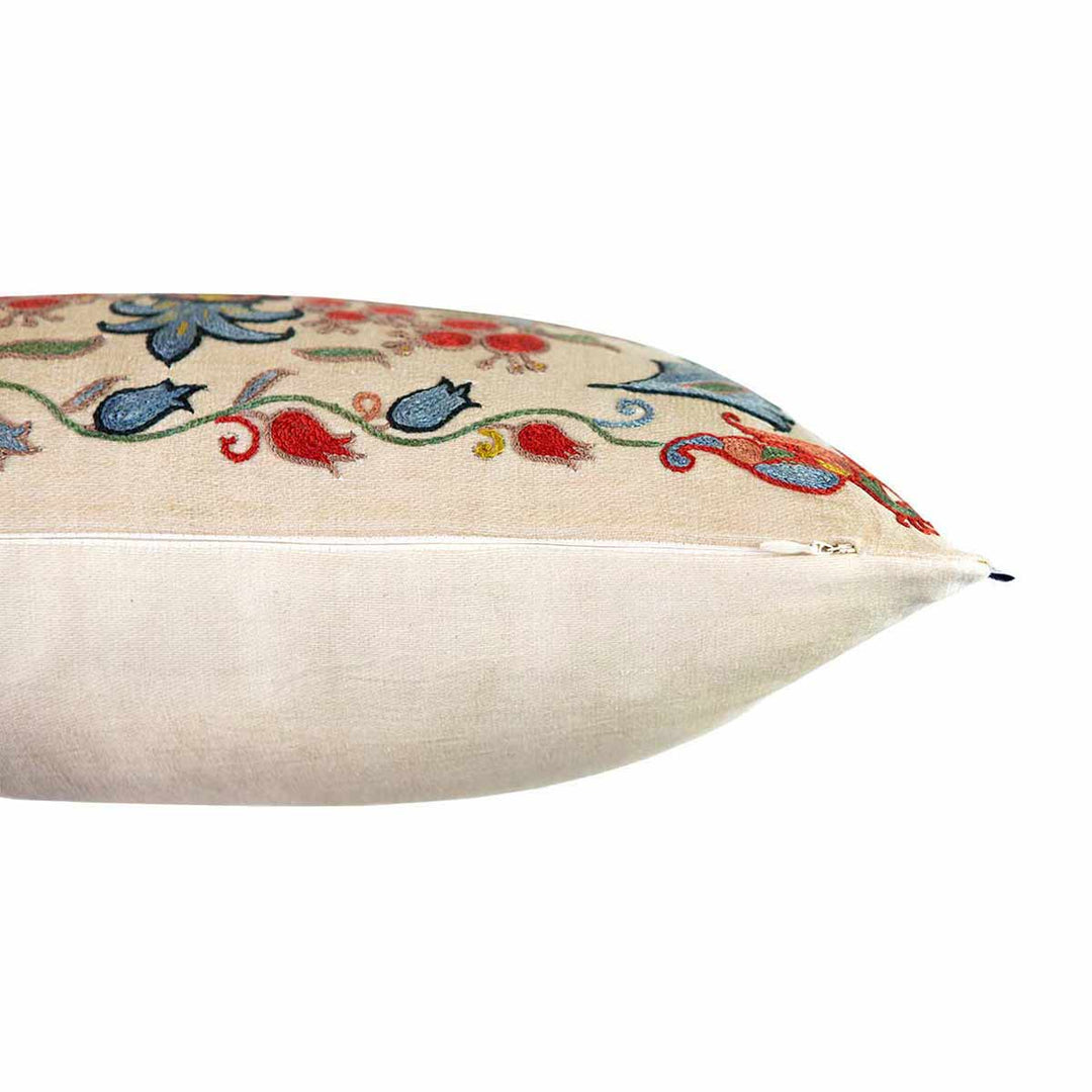 Side view of Mekhann's abstract embroidered cushion, here we can see where the front face and back face of the cushion meet, all finished off with the addition of a white zip to ensure easy fitting of the cushion pad.