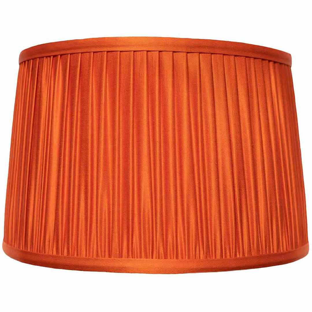 Mekhann's pure orange silk lampshade, front view highlighting the sumptuous pleated texture and vibrant colour.