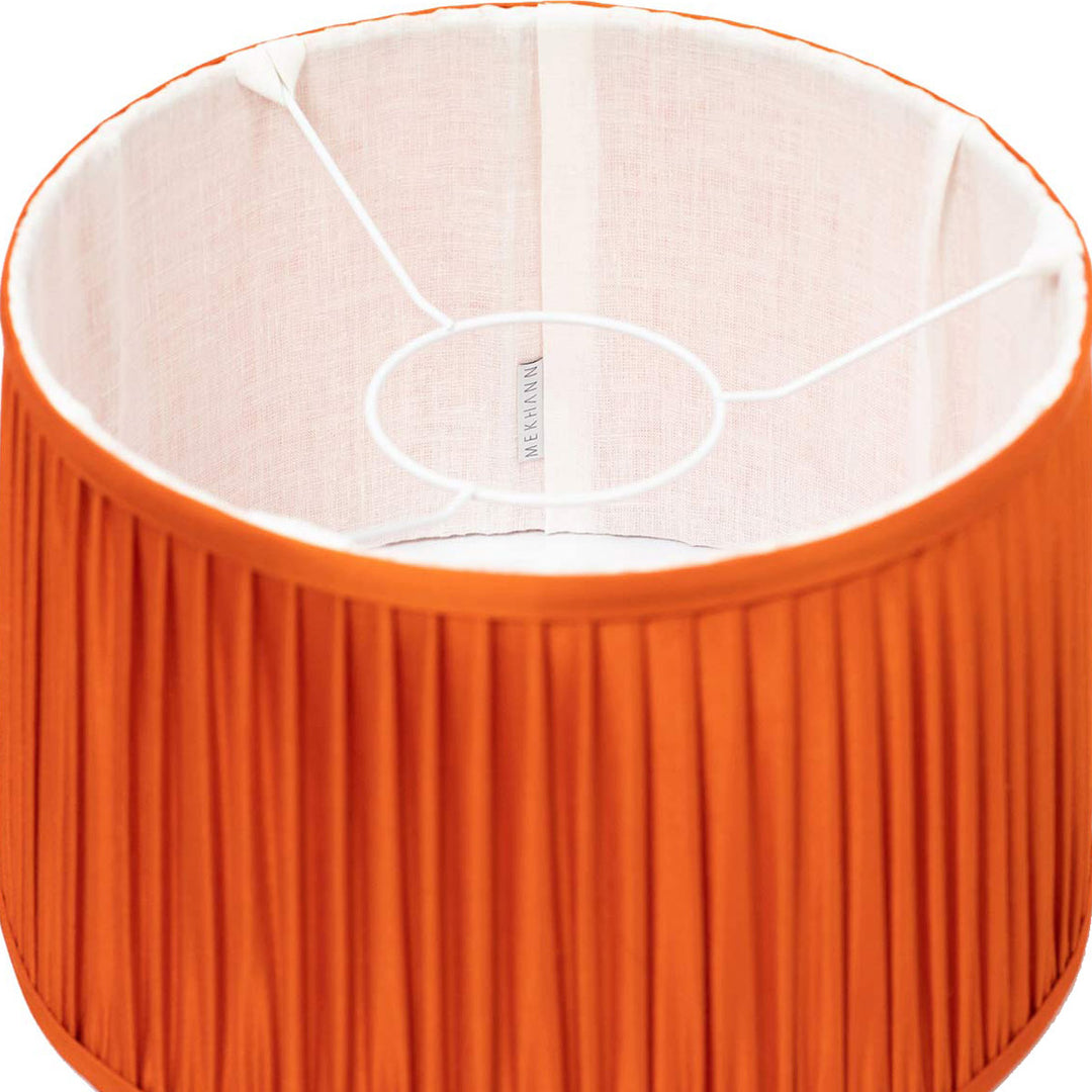 Inside view of Mekhann's luxurious orange silk lampshade, revealing the intricacy of its handcrafted interior.