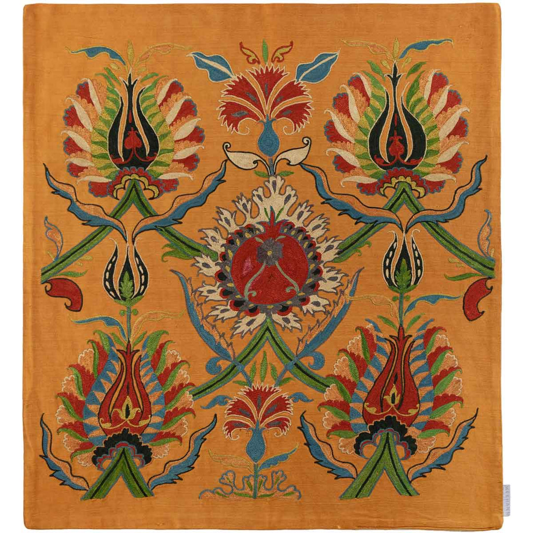 Front view of Mekhann's tulip caramel petite throw, displays an elegant symmetrical arrangement of tulip and floral motifs in a rich colour palette all set against a background of caramel coloured silk.