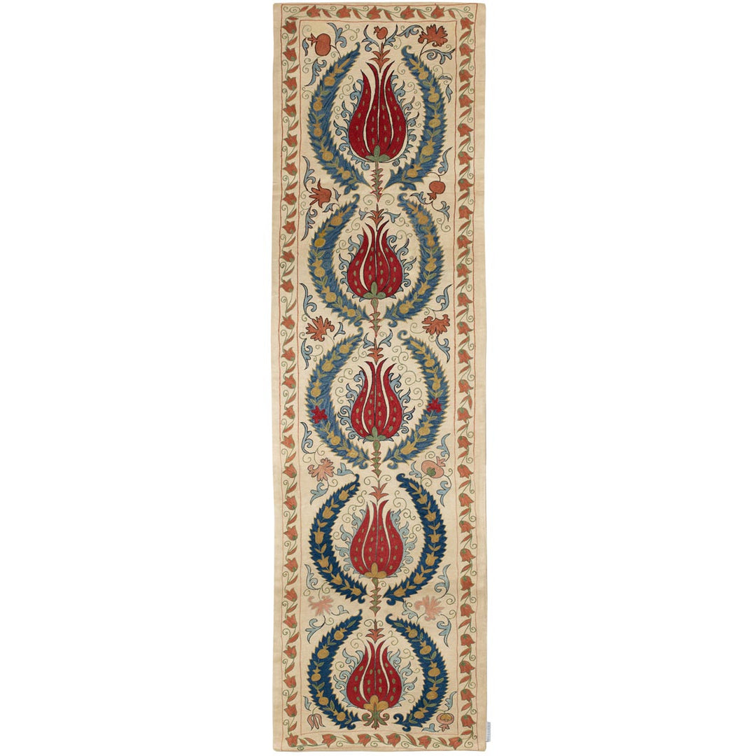 Front view of Mekhann's cream tulips runner, showing the full arrangement of the five main tulips and other floral motifs that cover the runner.
