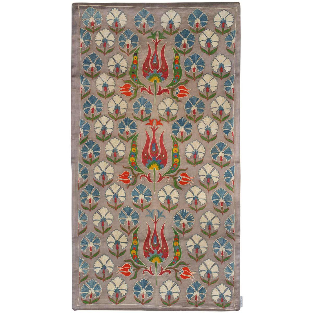 Front view of Mekhann's grey tulip runner, with a central pattern of red and blue tulips, adorned with floral designs, offering a classic yet contemporary look, all have been hand embroidered using silk yarns onto a grey silk fabric base.