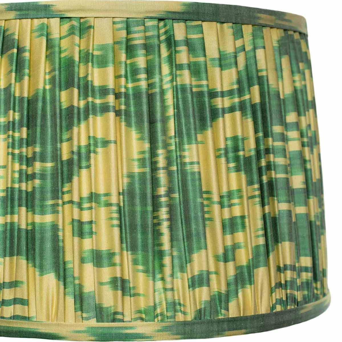 Close-up of the intricate ikat pattern on Mekhann's lampshade, with a focus on the eco-friendly dyes and handcrafted detail.
