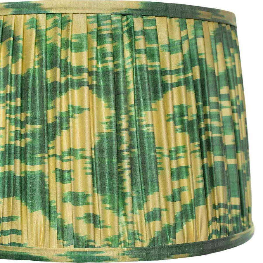 Close-up of the intricate ikat pattern on Mekhann's lampshade, with a focus on the eco-friendly dyes and handcrafted detail.