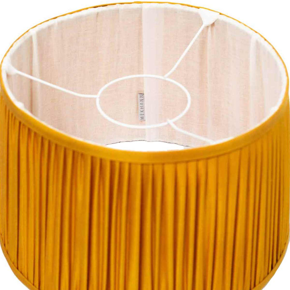 Inside look at Mekhann's yellow silk lampshade, showcasing the exquisite inner lining and quality.